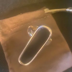 Cool black and silver knuckle ring.